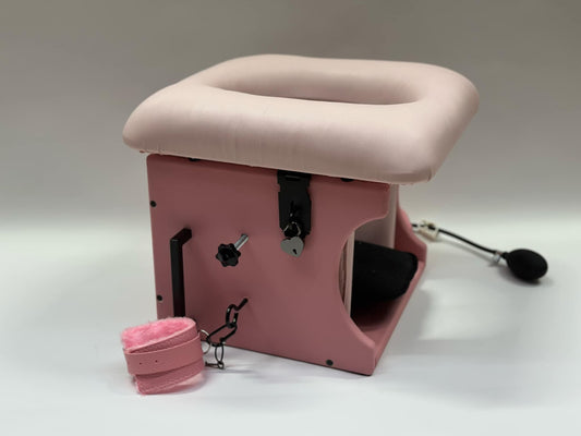 Adjustable smotherbox queening chair for BDSM sensory deprivation
Padded smotherbox queening chair in white for restraint play
Black smotherbox queening chair with adjustable ventilation
Pink smotherbox queening chair for solo or partner sensory play