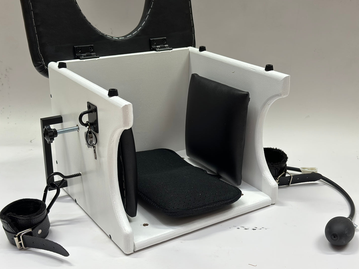 Intense Smotherbox Queening Chair with cushioned seat and sturdy wooden frame for sensory and BDSM play – discreet packaging included