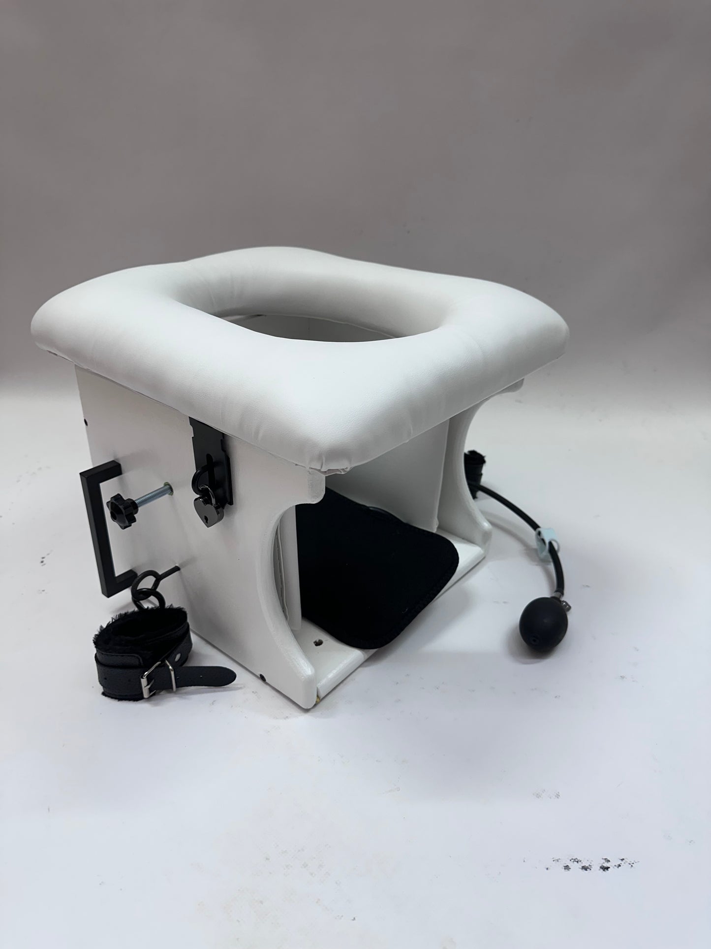 “Premium padded smotherbox for BDSM sensory deprivation play, adjustable size, safe restraint-ready design”