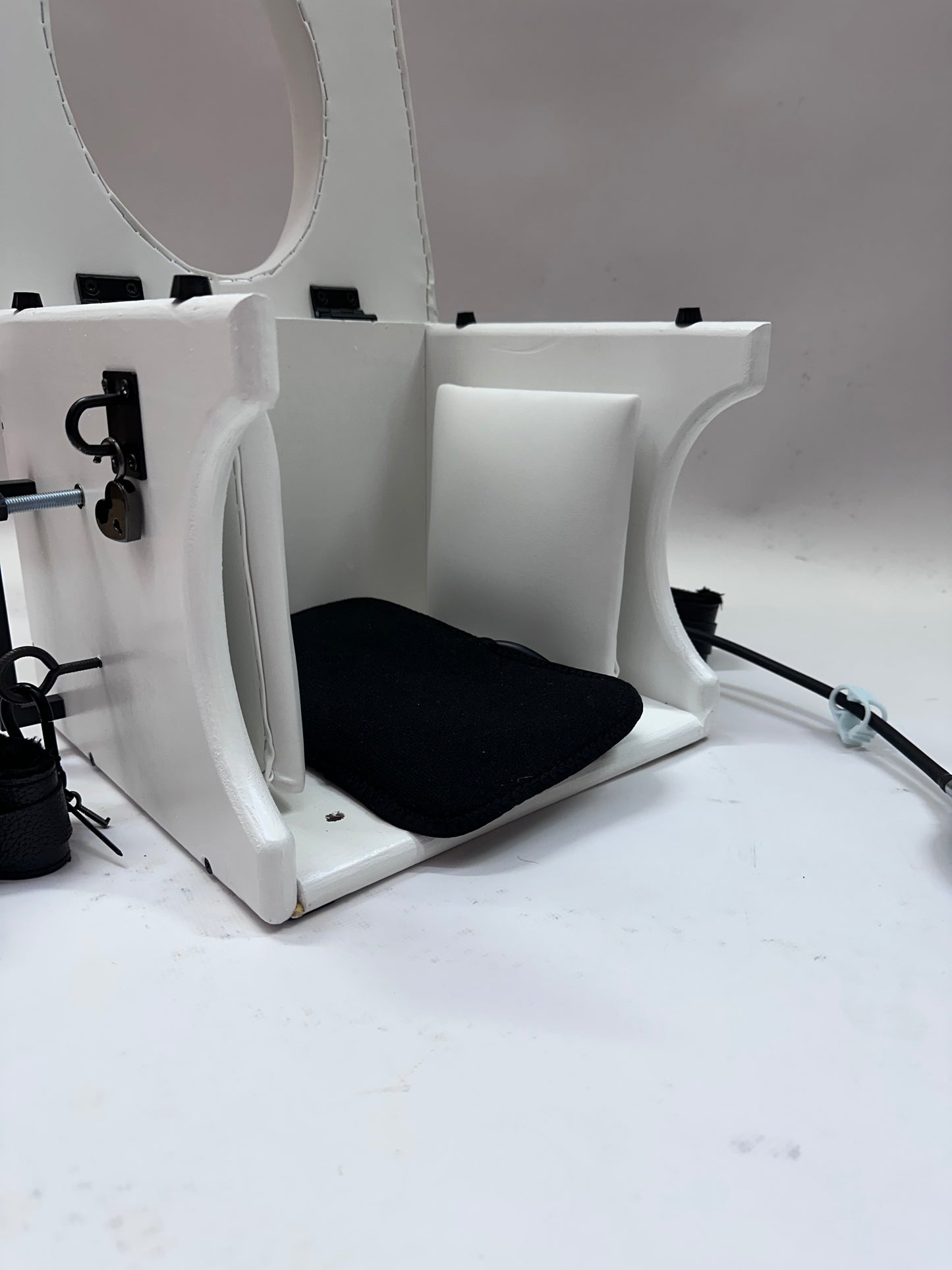 “Premium padded smotherbox for BDSM sensory deprivation play, adjustable size, safe restraint-ready design”