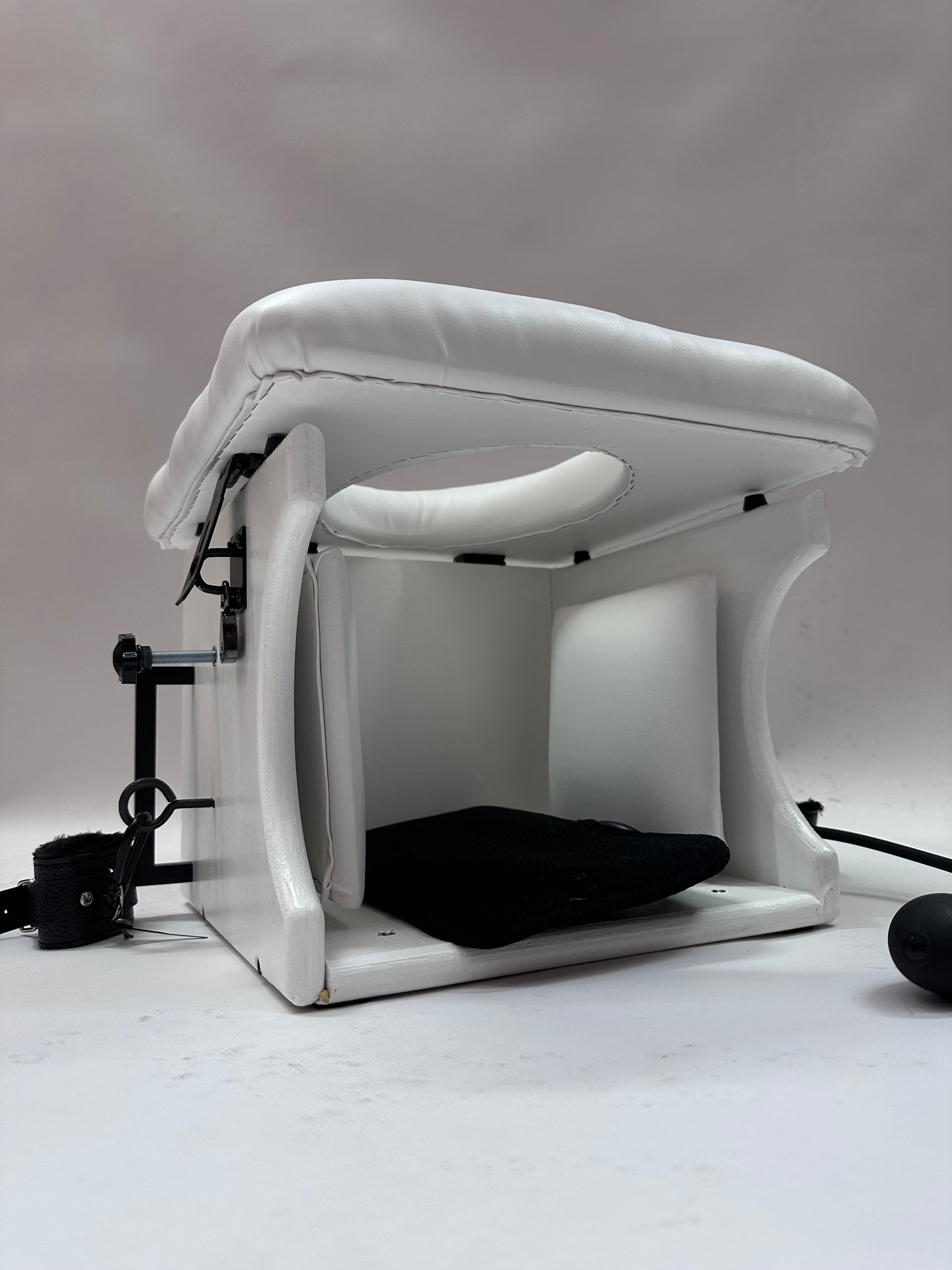 “Premium padded smotherbox for BDSM sensory deprivation play, adjustable size, safe restraint-ready design”