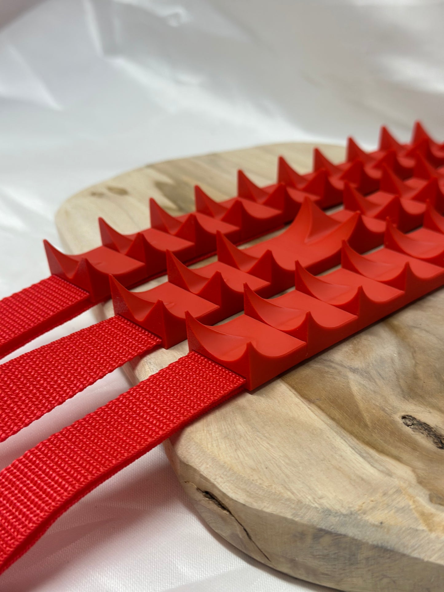 Close-up of cilicium spiked band showing double spike detail and durable strap