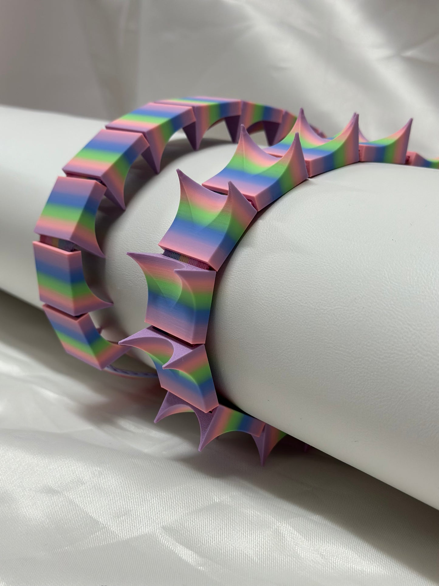Close-up of cilicium spiked band showing double spike detail and durable strap