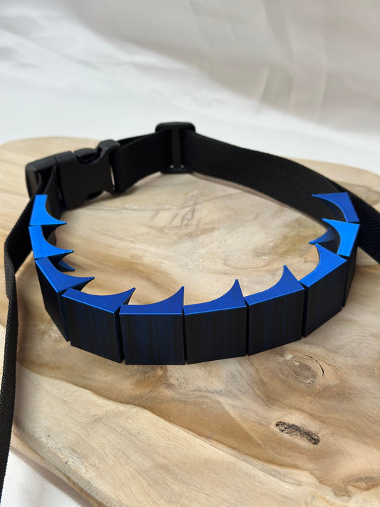 Close-up of cilicium spiked band showing double spike detail and durable strap