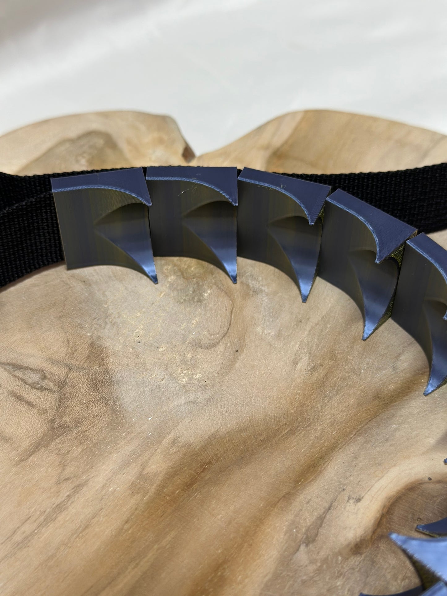Close-up of cilicium spiked band showing double spike detail and durable strap
