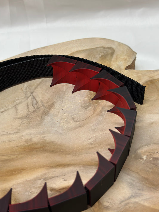 Close-up of cilicium spiked band showing double spike detail and durable strap