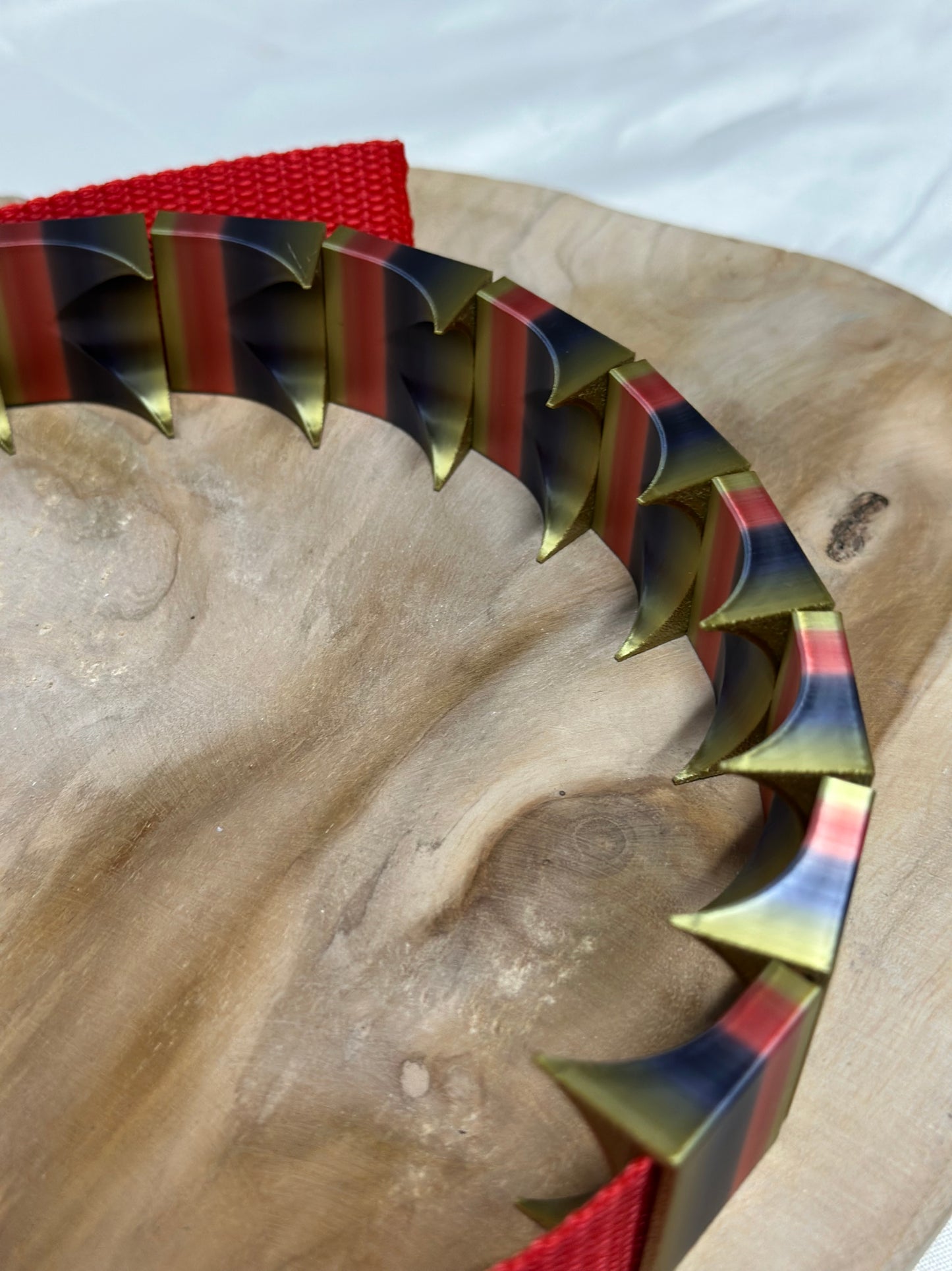 Close-up of cilicium spiked band showing double spike detail and durable strap