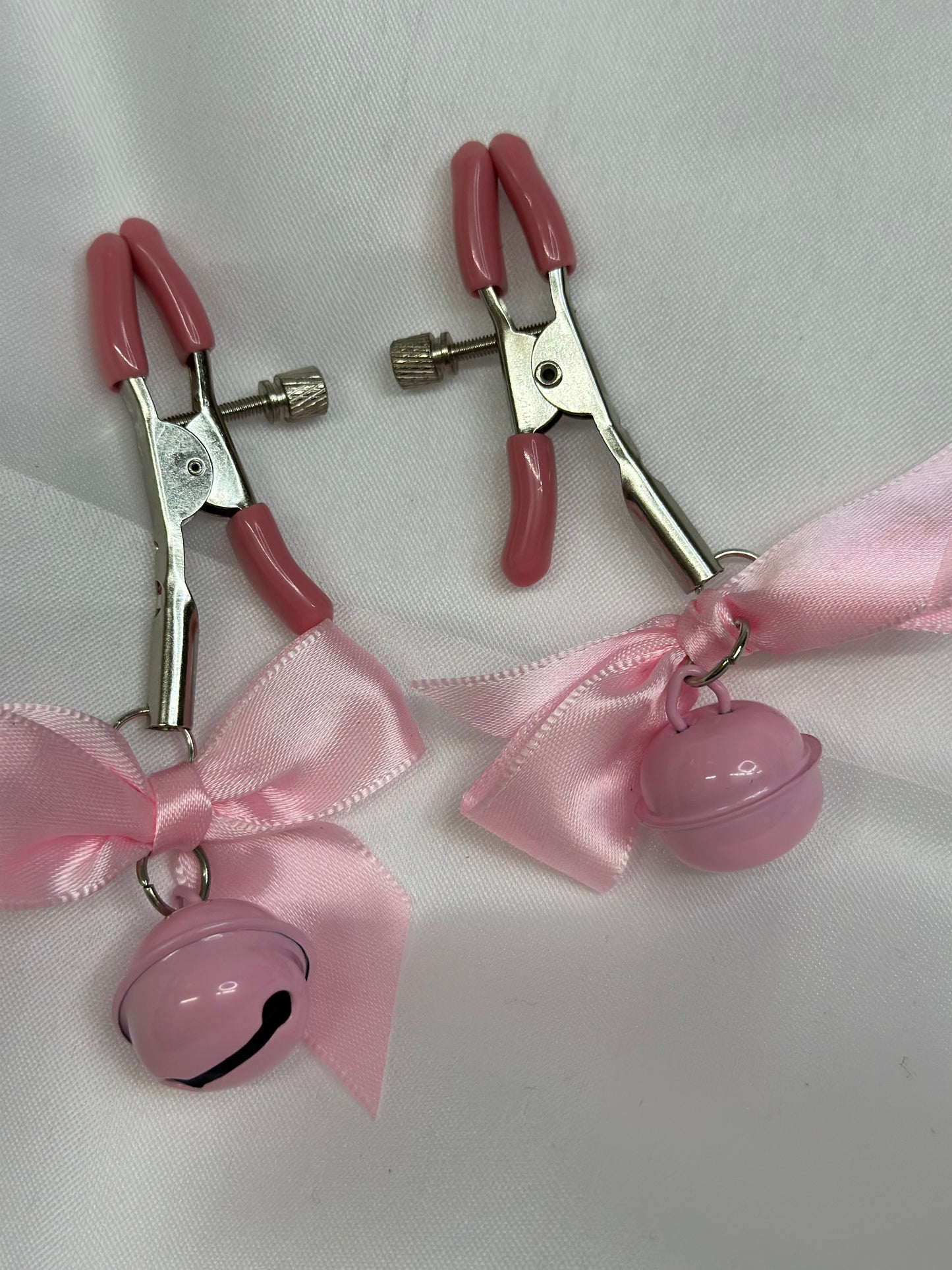 Fetish nipple clamps with bells and stylish ribbon bows