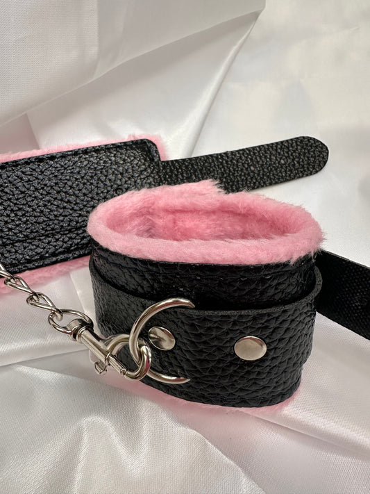 Purple soft faux leather handcuffs with adjustable buckle closure and sturdy metal hardware, perfect for BDSM, roleplay, and cosplay.