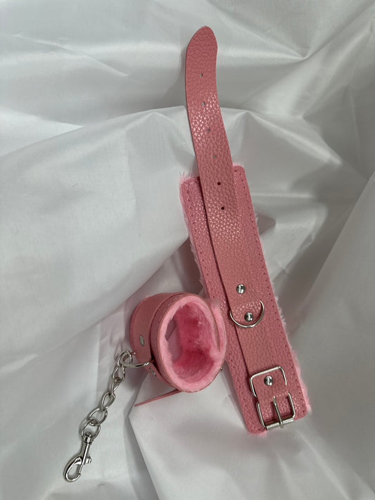 Purple soft faux leather handcuffs with adjustable buckle closure and sturdy metal hardware, perfect for BDSM, roleplay, and cosplay.
