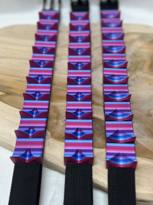 Close-up of cilicium spiked band showing double spike detail and durable strap