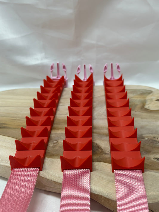 Close-up of cilicium spiked band showing double spike detail and durable strap