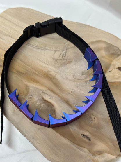 Close-up of cilicium spiked band showing double spike detail and durable strap