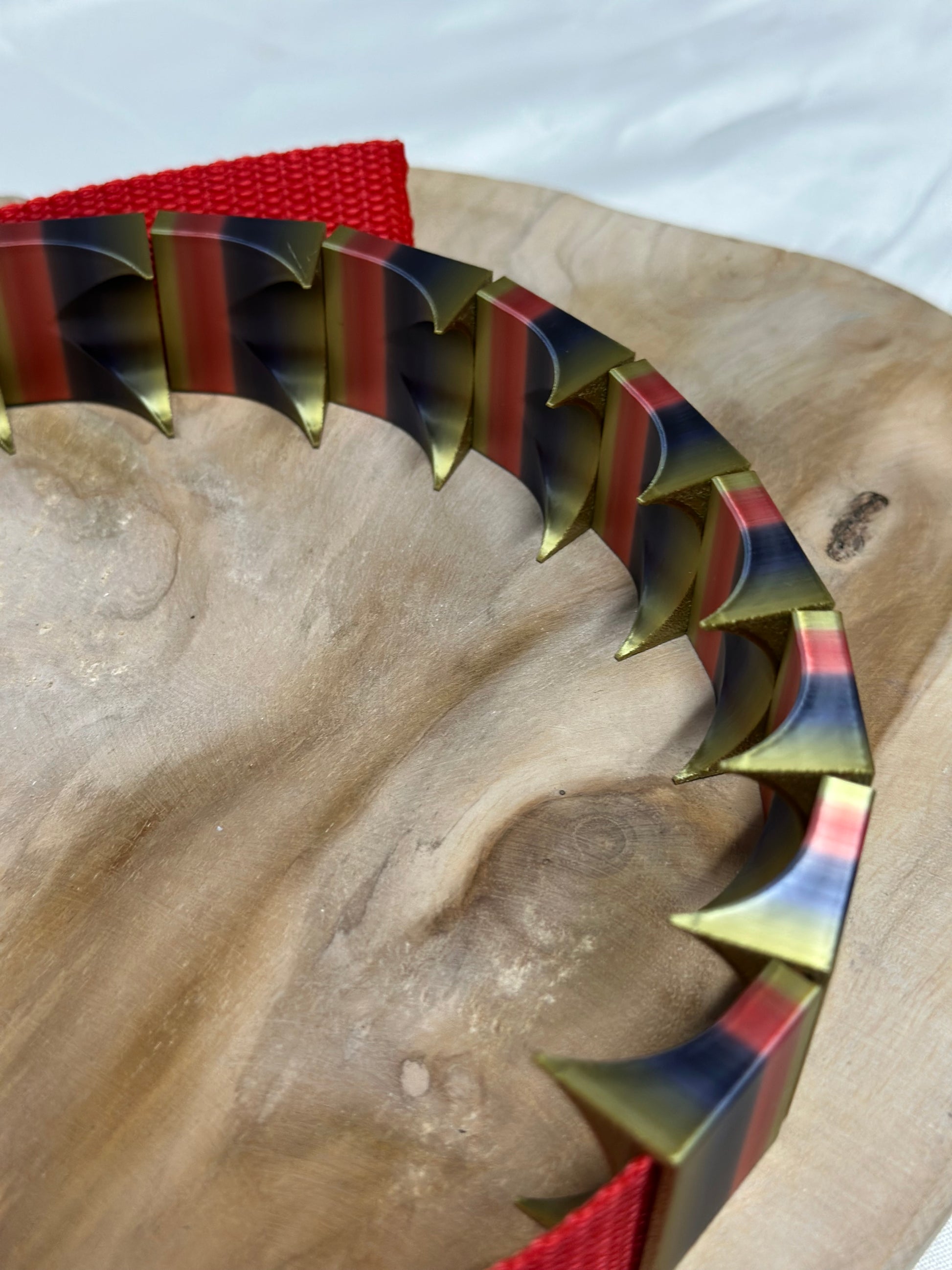 Close-up of cilicium spiked band showing double spike detail and durable strap