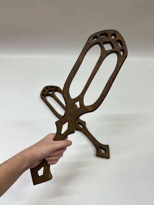 Handcrafted Gothic Cathedral Spanking Paddle made from premium hardwood with intricate cut-out designs for enhanced impact. Elegant, durable, and ergonomic, perfect for impact play or as a striking display piece.