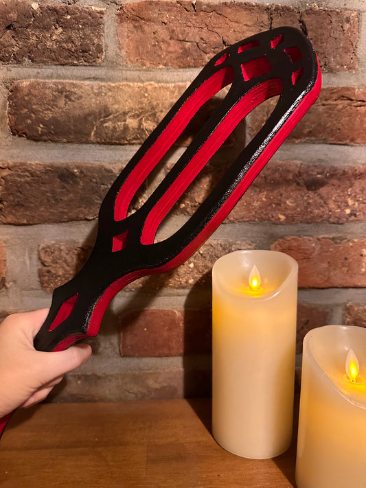 Handcrafted Gothic Cathedral Spanking Paddle made from premium hardwood with intricate cut-out designs for enhanced impact. Elegant, durable, and ergonomic, perfect for impact play or as a striking display piece.