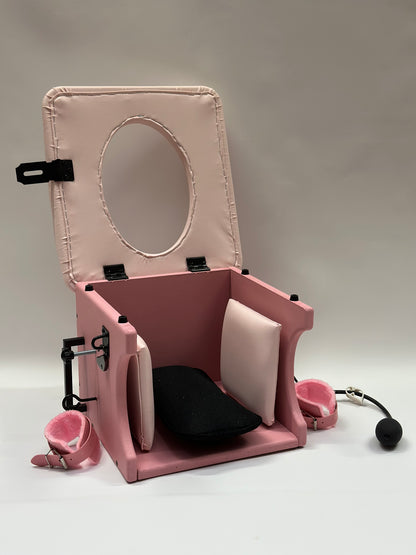 Adjustable smotherbox queening chair for BDSM sensory deprivation

Padded smotherbox queening chair in white for restraint play

Black smotherbox queening chair with adjustable ventilation

Pink smotherbox queening chair for solo or partner sensory play