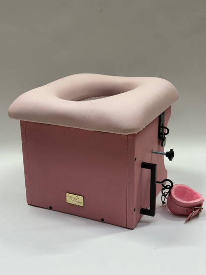 Adjustable smotherbox queening chair for BDSM sensory deprivation

Padded smotherbox queening chair in white for restraint play

Black smotherbox queening chair with adjustable ventilation

Pink smotherbox queening chair for solo or partner sensory play