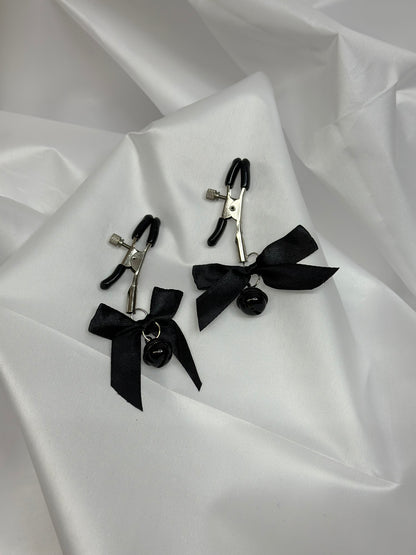 Adjustable metal nipple clamps with bows and bells