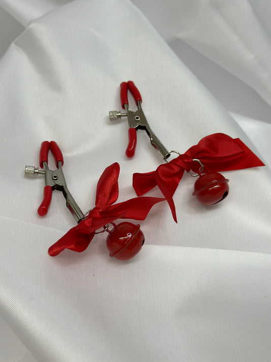 Fetish nipple clamps with bells and stylish ribbon bows
