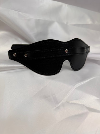 Adjustable faux leather blindfold for sensory play and BDSM, stylish and comfortable with secure strap