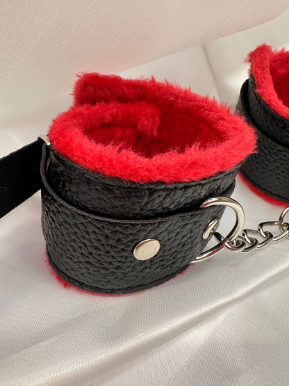 Purple soft faux leather handcuffs with adjustable buckle closure and sturdy metal hardware, perfect for BDSM, roleplay, and cosplay.