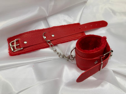 Purple soft faux leather handcuffs with adjustable buckle closure and sturdy metal hardware, perfect for BDSM, roleplay, and cosplay.