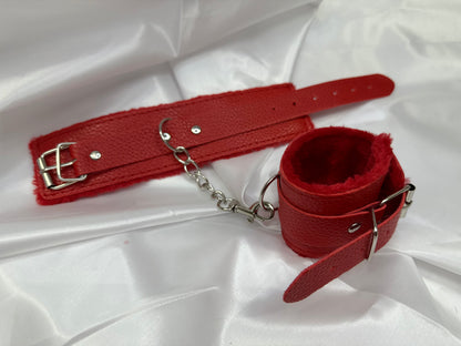 Purple soft faux leather handcuffs with adjustable buckle closure and sturdy metal hardware, perfect for BDSM, roleplay, and cosplay.