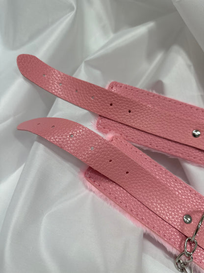 Purple soft faux leather handcuffs with adjustable buckle closure and sturdy metal hardware, perfect for BDSM, roleplay, and cosplay.