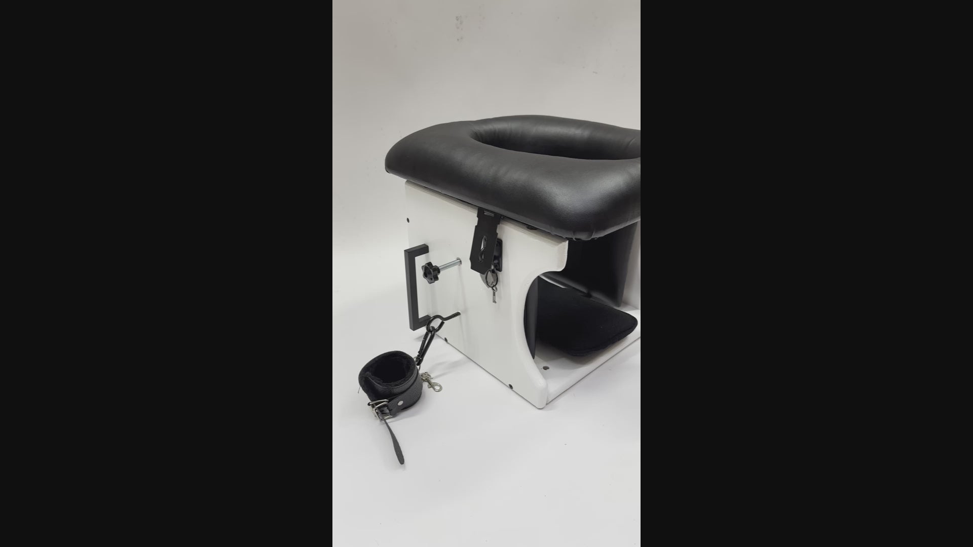 Intense Smotherbox Queening Chair with cushioned seat and sturdy wooden frame for sensory and BDSM play – discreet packaging included